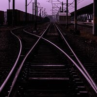 Raindrops Streaking Down a Train Window Revealing a City Awakening to Life - nøave